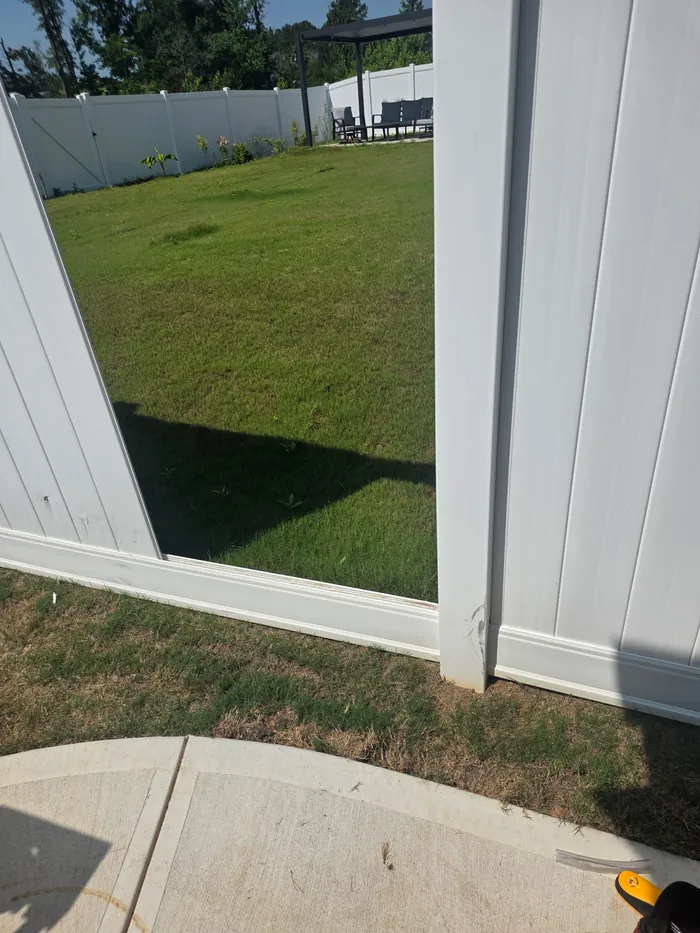 Vinyl Fence Panel Replaced: before (angle 1)