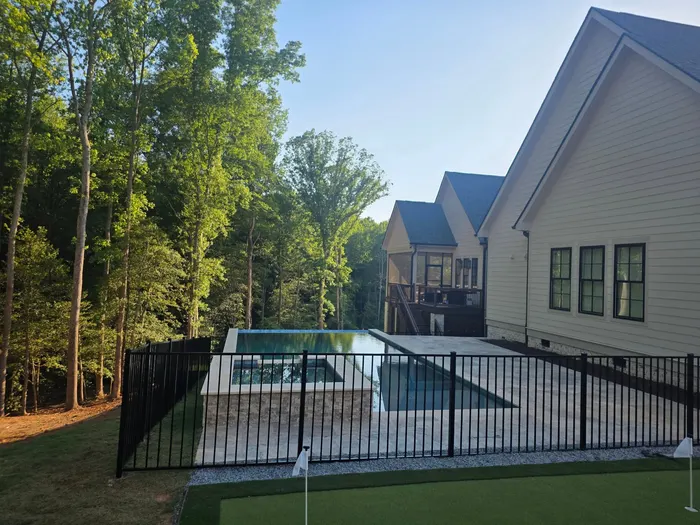 Aluminum pool fencing on a custom estate