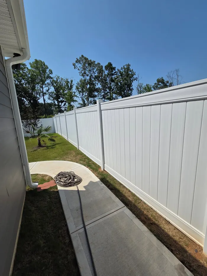 Vinyl privacy fencing, straight and clean